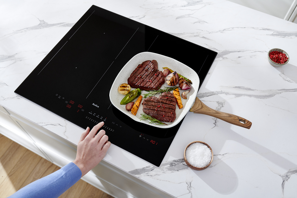 Perfekcyjne smażenie steków z płytą indukcyjną Amica