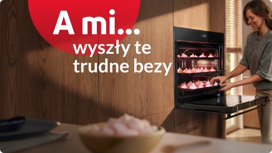 kobieta wyciąga r&oacute;żowe bezy z piekarnika. Napis: A mi wyszły te trudne bezy